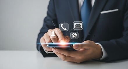 Businessman using smartphone with contact icons for communication and customer service