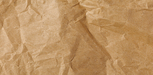 Fototapeta premium Brown texture kraft paper, recycled cardstock. Old crumpled recycled paper of old crumpled recycled paper