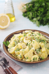 A bowl with Greek potato salads	