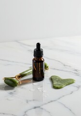 Skincare Tools: Facial Roller and Cosmetic Liquid Dropper