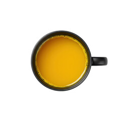 A top-down view of a black mug filled with vibrant orange juice against a plain background