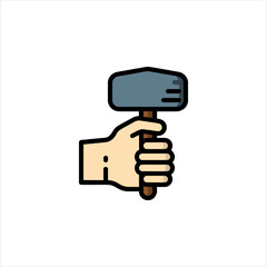 Hand holding a sledgehammer tightly, ready to strike in a workshop, showcasing strength and determination for construction or repair work.