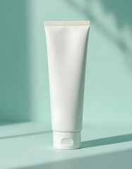 Elegant blank white tube mockup ready for your branding and product designs on pastel mint background