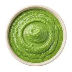 Creamy green pesto sauce in a bowl, ready for culinary use, with a neutral background