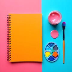 A top-down view of a colorful art workspace on a vibrant background