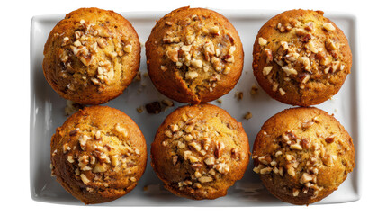 A delicious plate of nut-topped muffins, perfect for breakfast or snacks, isolated on white background.