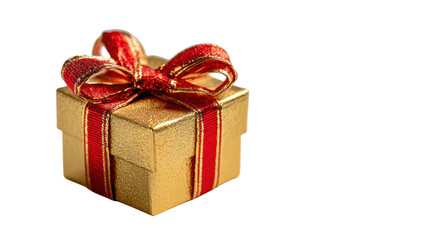 Obraz premium Elegant gold gift box with a red ribbon, perfect for celebrations and special occasions.