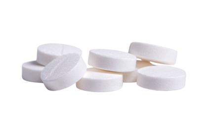 White round tablets on a white background, perfect for health-related content.
