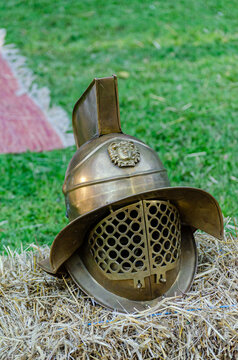 Roman gladiator equipment during a historic reenactment event. Helmet of retiarius gladiator type