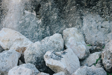 Small Grey pebbles background for home and home interior decoration, simple stones background