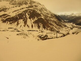 mountain landscape in winter with sand blowing inn.
Galtur 2022