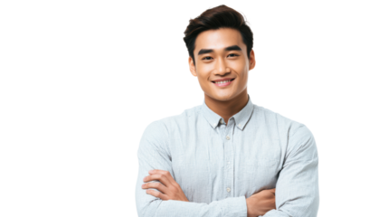 Smiling man with crossed arms, casual attire, exuding confidence and friendliness, isolated on white background.