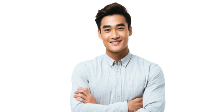Smiling man with crossed arms, casual attire, exuding confidence and friendliness, isolated on white background.