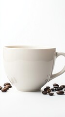 A beige mug with a handle sits on a white surface surrounded by scattered coffee beans