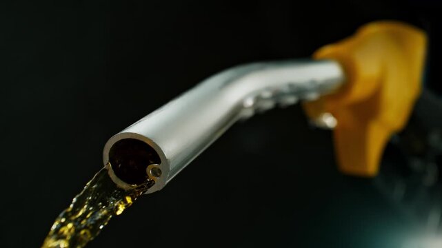 Super Slow Motion Gasoline Pouring from Fuel Nozzle at 1000fps.