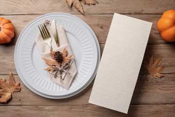 Blank 4x9 menu card  on table setting with autumn leaves