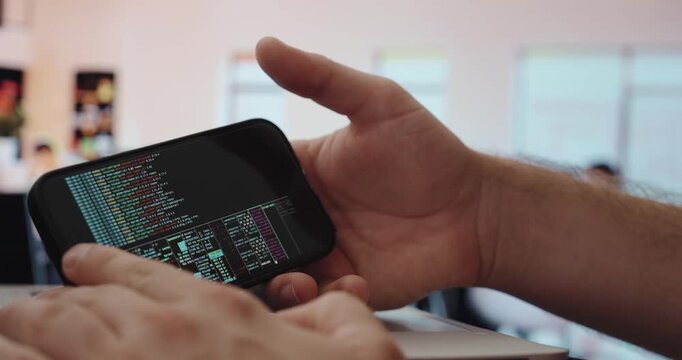 A smartphone using AI technology to rapidly generate programming code, enabling fast work