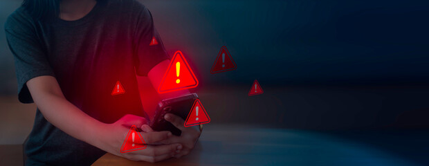 Woman using smartphone with scam alert icon. Fraud software warning. Cyber security. Hacker attack detection on internet network. Virus, spyware, malware, cybercrime. Data protection.