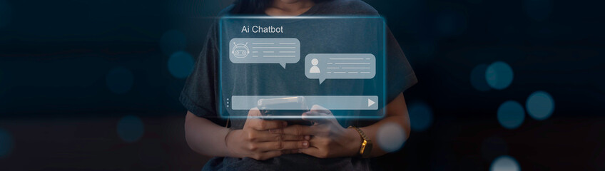 A woman is using her smartphone to interact with a friendly AI chatbot, demonstrating modern technology and digital communication.