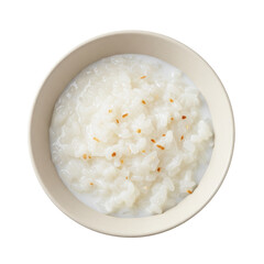 A close-up view of a bowl of creamy rice porridge garnished with sesame seeds, set against a plain background