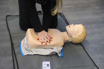 first aid course - company safety - cardiac massage - Basic Life Support. cardiac massage on...