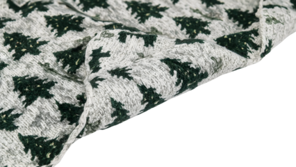 Cozy knit fabric with green tree pattern on gray background: winter fashion textile