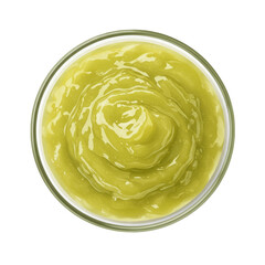 A close-up view of a vibrant green sauce in a glass bowl, showcasing its smooth texture and rich color
