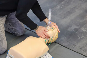first aid course - company safety - cardiac massage - Basic Life Support. cardiac massage on...