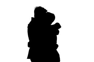 Silhouette of couple embracing showing love and affection