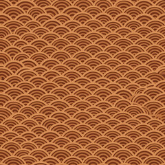 A traditional Japanese wave pattern background. Seamless abstract geometric texture with overlapping scales in warm terracotta brown.