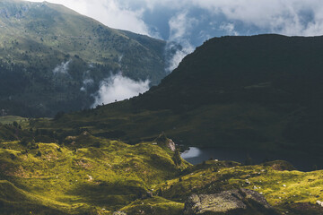 mountain landscape in the mountains with dramatic stormy clouds