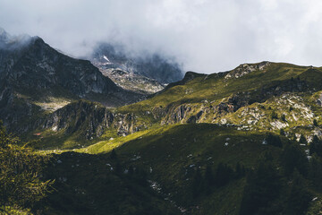 mountain landscape with stormy clouds and dramatic light