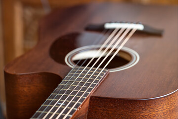 Classic brown wooden mahogany acoustic western guitar