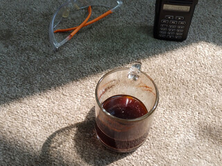 Relaxing Morning Routine: Aromatic Coffee Brew in Glass Mug with Walkie-Talkie and Protective...