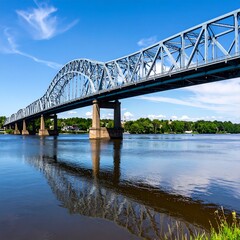 Obraz premium Steel arch bridge over river (2)