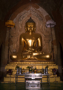 Golden buddha inside a temple, Bagan, Myanmar
