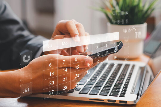 Business Planning Calendar and Project management concept. Businessman manages time for effective work. Calendar on the virtual screen interface. Time management. Reminder appointment.
