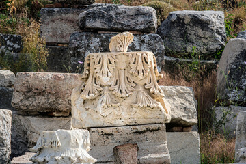 Decorative element of the cornice of a building on the ruins of the ancient city of Sagalassos in Turkey