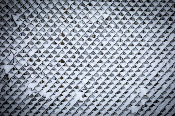 Snow Covered Metal Fence Pattern in Winter