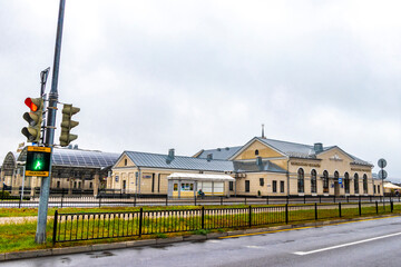Brest Central train station carriages tracks pedestrian bridge building Belarus.