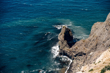 Cape Fiolent in Crimea, view of Black Sea and cliff in summer on sunny day
