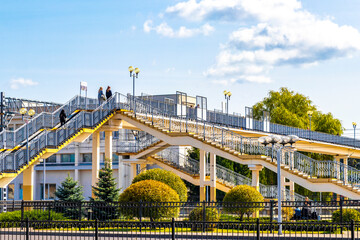 Brest Central train station carriages tracks pedestrian bridge building Belarus.