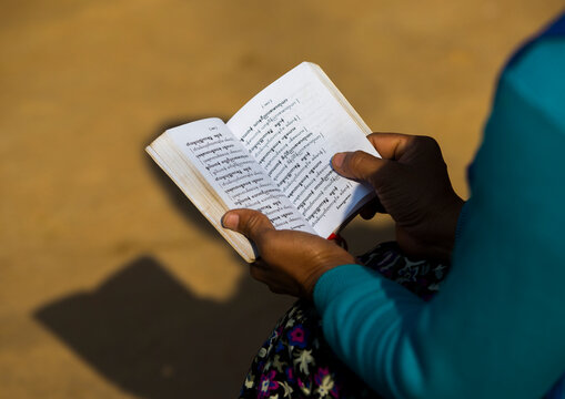 Girl reading a book, Inle lake, Myanmar
