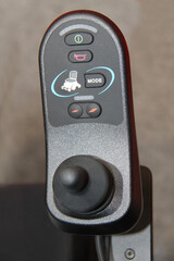 Hand Controls of a Modern Mobility Scooter Wheelchair.