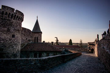 Kalemegdan Park in Belgrade, Serbia. A medieval fortress with thick stone walls and a round tower....