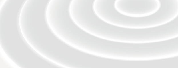 Obraz premium White background with a soft, concentric circle pattern. The white background has a smooth, modern texture, creating a calming effect. Circular pattern background. Gray background vector.