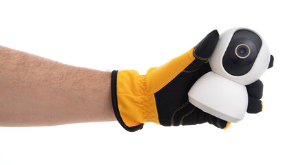 Holding a security camera with a protective glove
