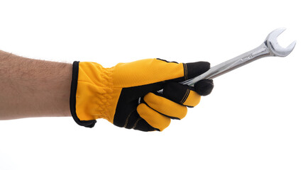 Hand holding a wrench in work glove