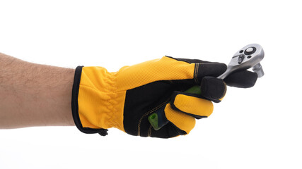 Yellow tool held by gloved hand