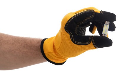Hand in glove holding a small LED light